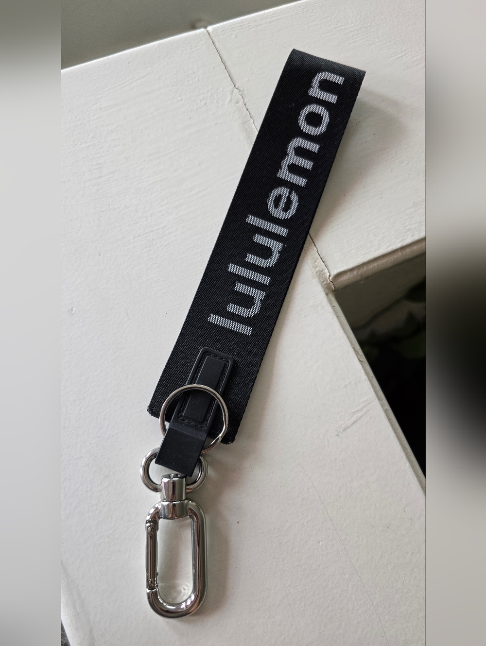 Lululemon Athletica Black Logo Strap Keychain with Silver Hardware